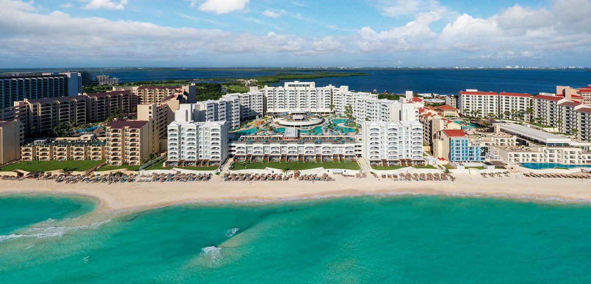 $250 in instant savings + Kids & teens stay & eat free at Hilton Cancun Mar Caribe All-Inclusive